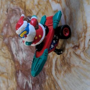 Santa on rocket push toy